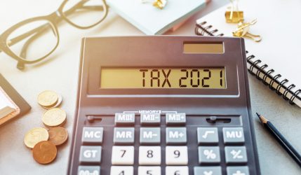 Word,Tax,2021,On,Calculator.,Business,And,Tax,Concept,On