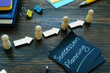 Succession,Planning,Sign,And,Figurines,With,Arrows.