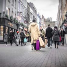 Abstract,Motion,Blurred,Shopper,Carrying,Shopping,Bags,On,Crowded,London