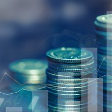 Financial,Investment,Concept,,Double,Exposure,Of,City,Night,And,Stack