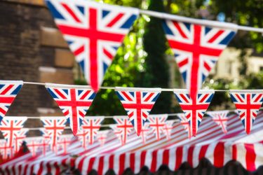 Union,Jack,Flag,Triangular,Bunting,Hanging,In,A,Street,,A