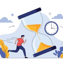 Man,Racing,Against,Giant,Hourglass,With,Sand,Falling,And,Clock